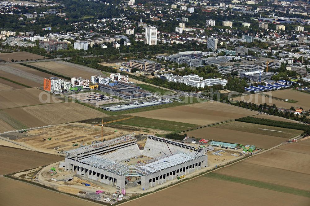 Mainz from above - Blick auf den Neubau der Coface Arena im Stadtteil Bretzenheim. Das neue Stadion des Fußballklubs FSV Mainz 05 soll 33.500 Plätze bieten und zu Beginn des Jahres 2011 fertiggestellt werden. Bauherr und Eigentümer ist die Grundstücksverwaltungsgesellschaft (GVG) der Stadt Mainz. Ausführende Baufirma ist die BAM Deutschland AG. View of the new Coface Arena in the district Bretzenheim. The new stadium of the football club FSV Mainz 05 will provide 33,500 seats and will be completed at the beginning of 2011. Builder and owner of the property is the real estate management society of the city of Mainz (GVG).