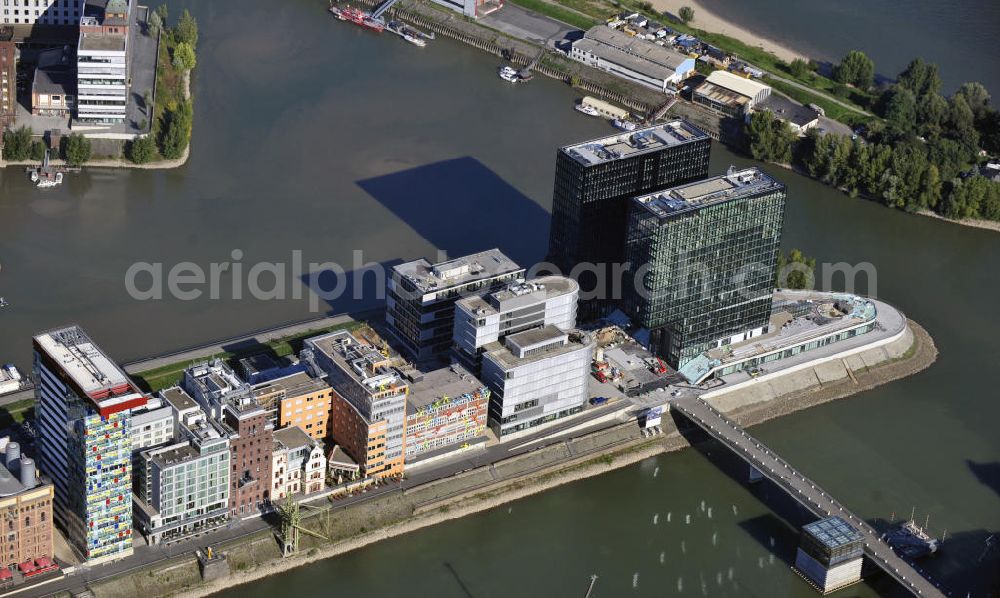 Düsseldorf from the bird's eye view: Sicht auf das Colorium und die Zwillingstürme an der Spitze der Speditionsstraße im Medienhafen. View to the Colorium and to the Twin Towers at the end of the road.