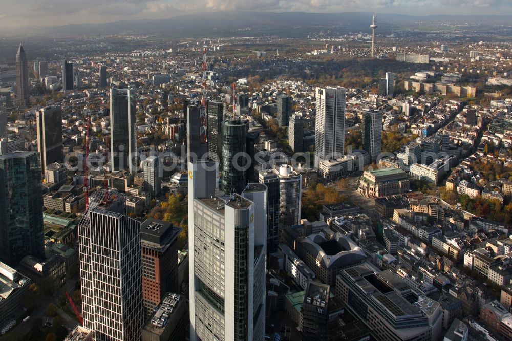 Aerial image Frankfurt am Main - Cityscape of the skyscraper skyline in the banking and insurance district of the Frankfurt on the Main city center in the state Hesse. In the center, the high-rise of the Commerzbank. Foto Alfons Rath