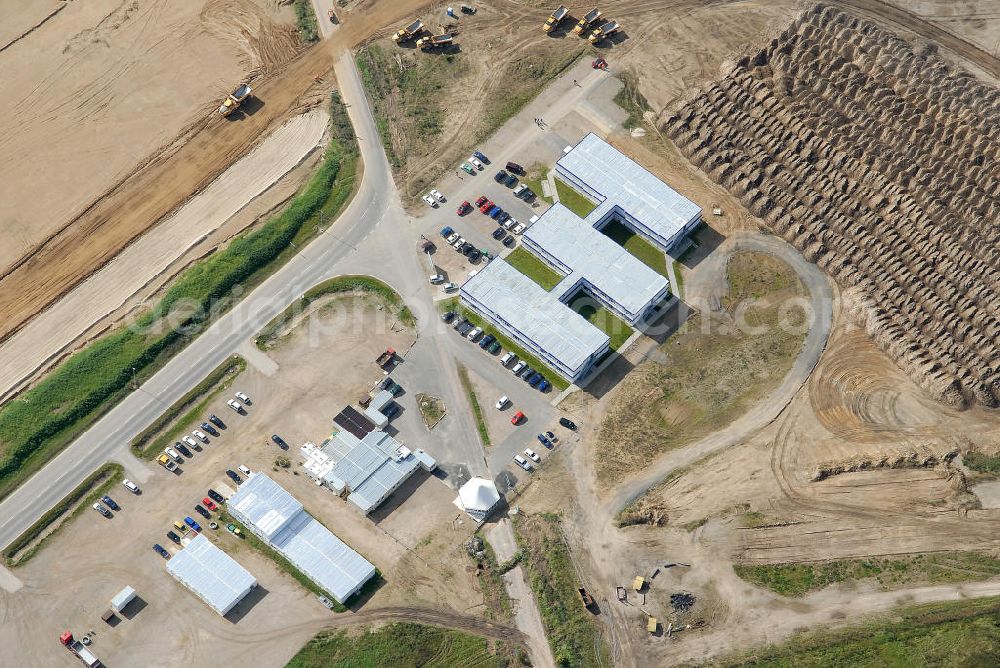 Schönefeld from above - Blick auf die Container der Baustelle des Schönefelder Flughafens (BBI). Die Container wurden aufgestellt um, bis zur Fertigstellung des Regierungsterminals, Staatsgäste zu empfangen. View of the container of the construction site of Schönefeld airport (BBI). The containers were placed until the completion of the Government of terminals to receive state guests.