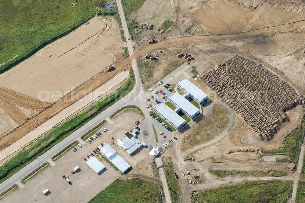 Schönefeld from the bird's eye view: Blick auf die Container der Baustelle des Schönefelder Flughafens (BBI). Die Container wurden aufgestellt um, bis zur Fertigstellung des Regierungsterminals, Staatsgäste zu empfangen. View of the container of the construction site of Schönefeld airport (BBI). The containers were placed until the completion of the Government of terminals to receive state guests.