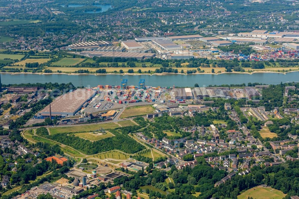 Aerial photograph Duisburg - Building complex and grounds of DIT Duisburg Intermodal Terminal in the logistics center logport on the left riverbank of the Rhine in Duisburg in the state of North Rhine-Westphalia. The center is part of the harbour duisport and located in the Rheinhausen part of Duisburg