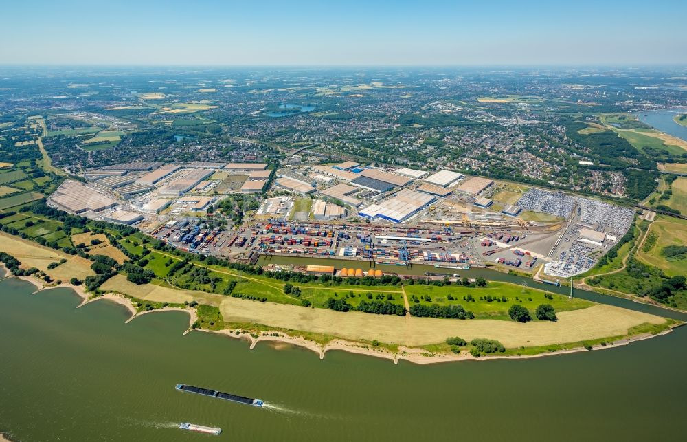 Duisburg from the bird's eye view: Building complex and grounds of DIT Duisburg Intermodal Terminal in the logistics center logport on the left riverbank of the Rhine in Duisburg in the state of North Rhine-Westphalia. The center is part of the harbour duisport and located in the Rheinhausen part of Duisburg