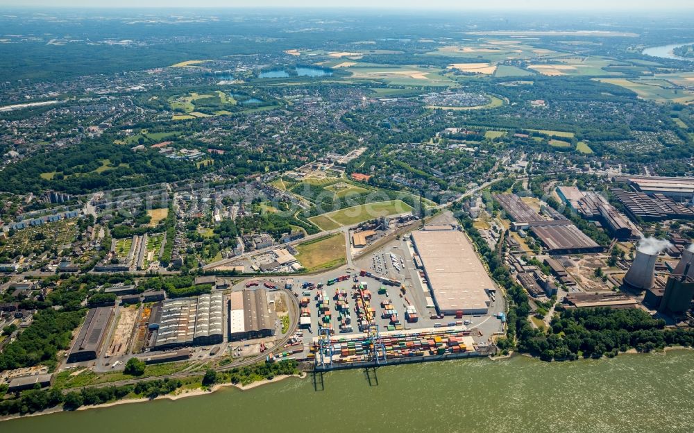 Duisburg from above - Building complex and grounds of DIT Duisburg Intermodal Terminal in the logistics center logport on the left riverbank of the Rhine in Duisburg in the state of North Rhine-Westphalia. The center is part of the harbour duisport and located in the Rheinhausen part of Duisburg