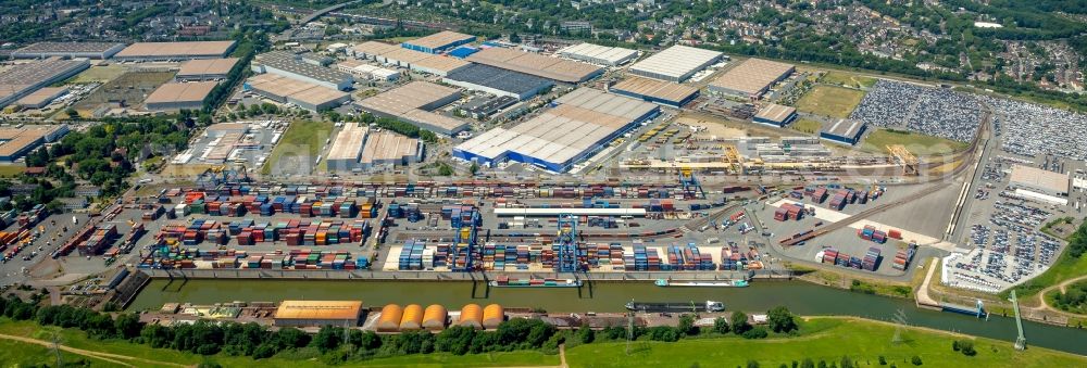 Duisburg from the bird's eye view: Building complex and grounds of DIT Duisburg Intermodal Terminal in the logistics center logport on the left riverbank of the Rhine in Duisburg in the state of North Rhine-Westphalia. The center is part of the harbour duisport and located in the Rheinhausen part of Duisburg