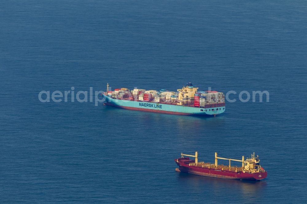 Wangerooge from above - Container cargo ship container shipping company Maersk Line off the coast of Wangerooge in the North Sea in Lower Saxony