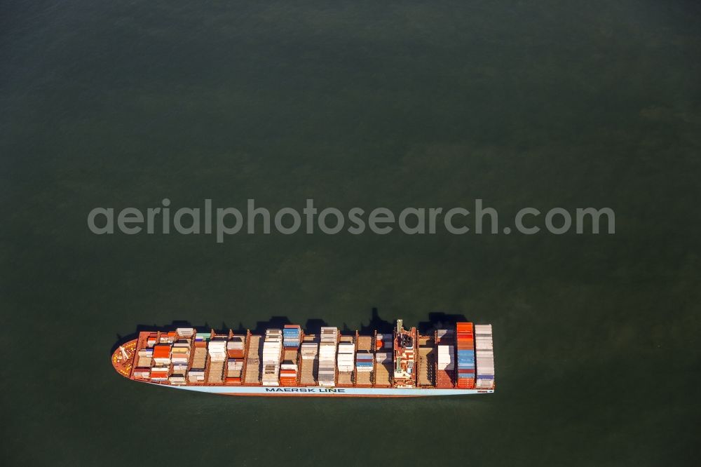 Aerial image Wangerooge - Container cargo ship container shipping company Maersk Line off the coast of Wangerooge in the North Sea in Lower Saxony