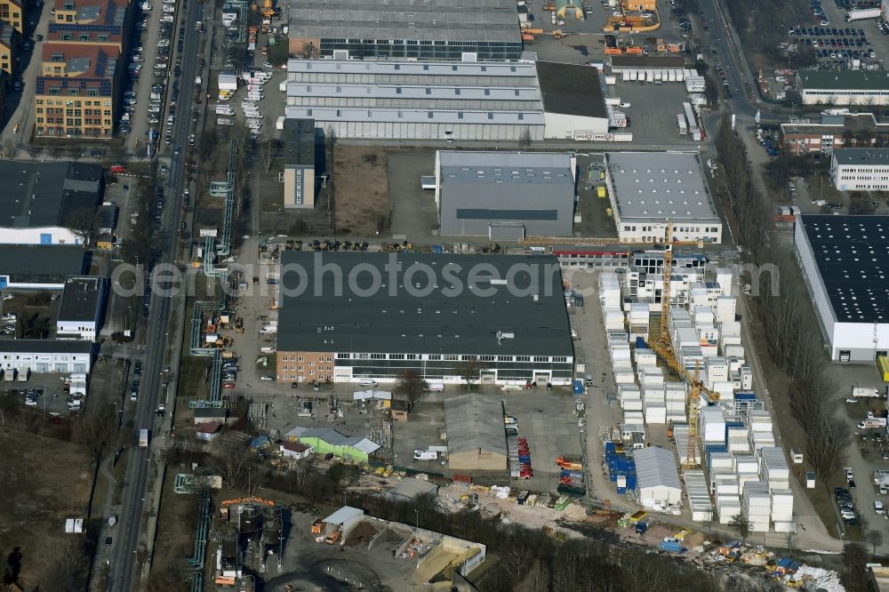 Berlin from the bird's eye view: Bearing surface Zeppelin Rental GmbH & Co. KG and BEK Systemtechnik GmbH & Co. KG in the industrial area in the district Hohenschoenhausen in Berlin