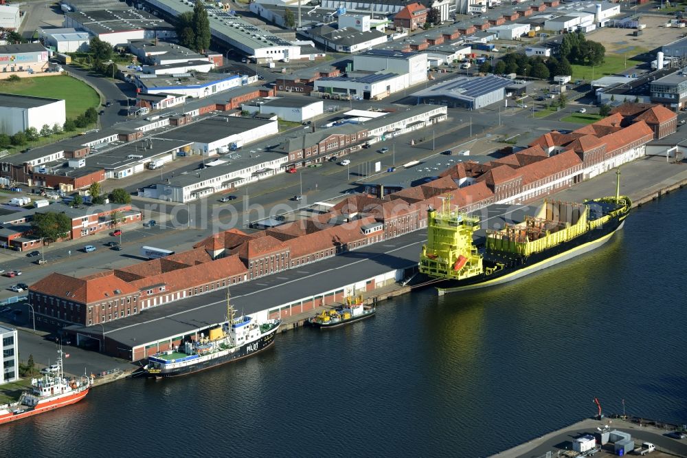 Aerial image Bremerhaven - Container ship BORUSSIA DORTMUND in the port in Bremerhaven in the state Bremen. It belongs to the shipping company Rudolf Schepers KG