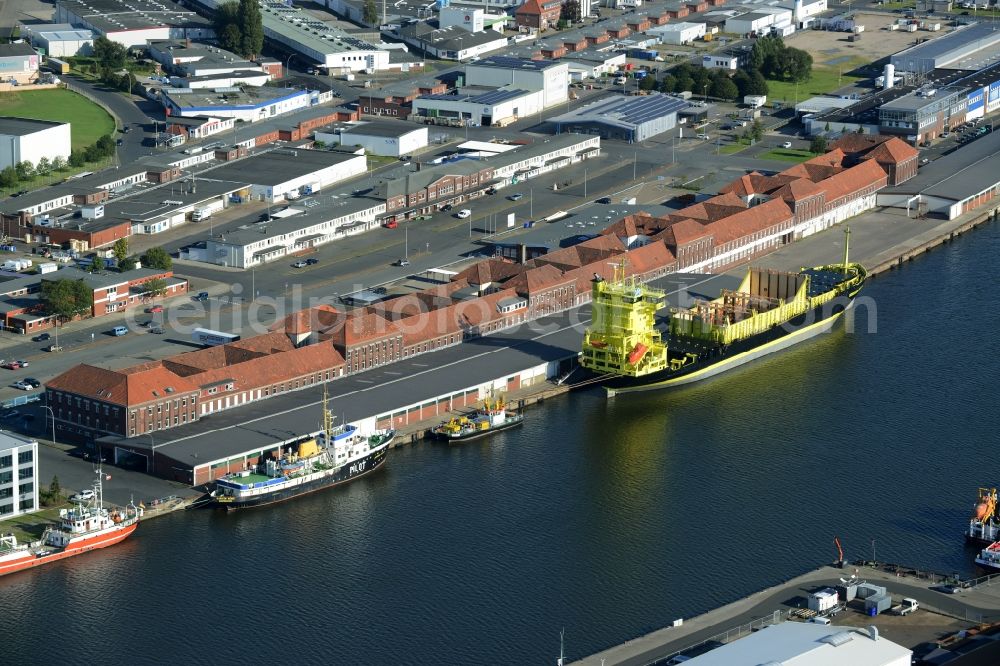 Aerial photograph Bremerhaven - Container ship BORUSSIA DORTMUND in the port in Bremerhaven in the state Bremen. It belongs to the shipping company Rudolf Schepers KG