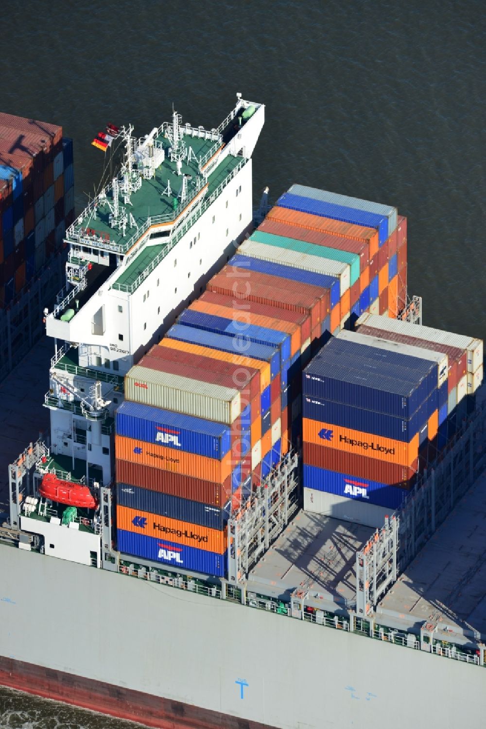 Aerial photograph Cuxhaven - Container ship - the cargo shipping company NYK Line NYK Hercules GmbH in driving off the North Sea coast near Cuxhaven in Lower Saxony