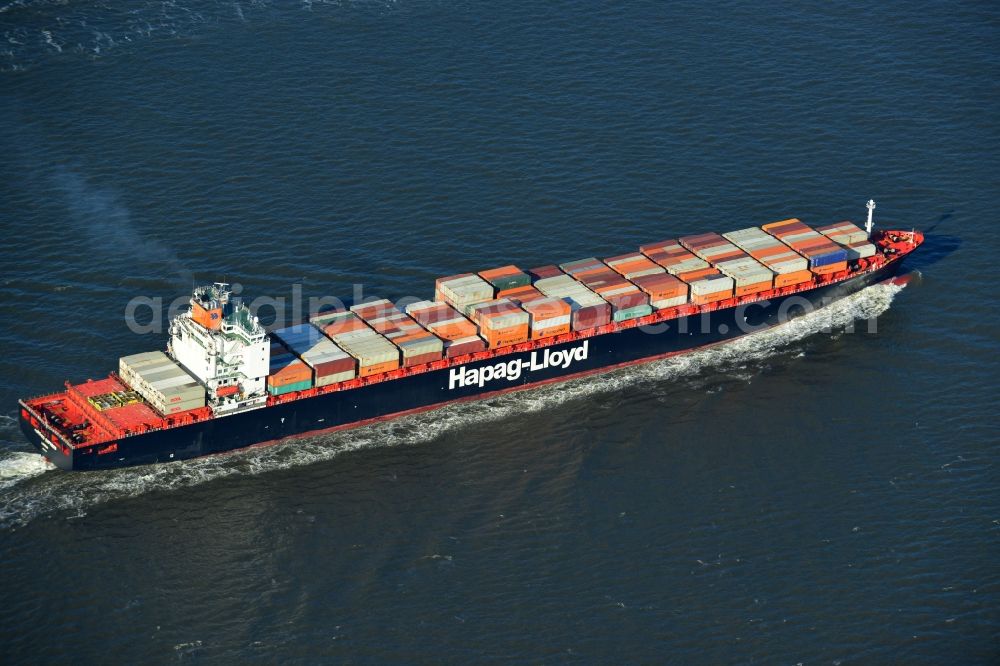 Cuxhaven from above - Container Ship - Freighter TORONTO EXPRESS London shipping company Hapag-LLOYD at driving off the North Sea coast near Cuxhaven in Lower Saxony