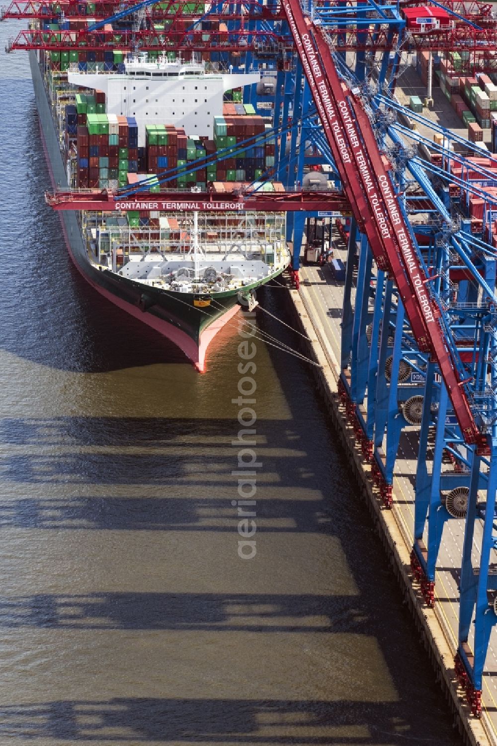 Aerial image Hamburg - Container ship in the port in Hamburg, Germany