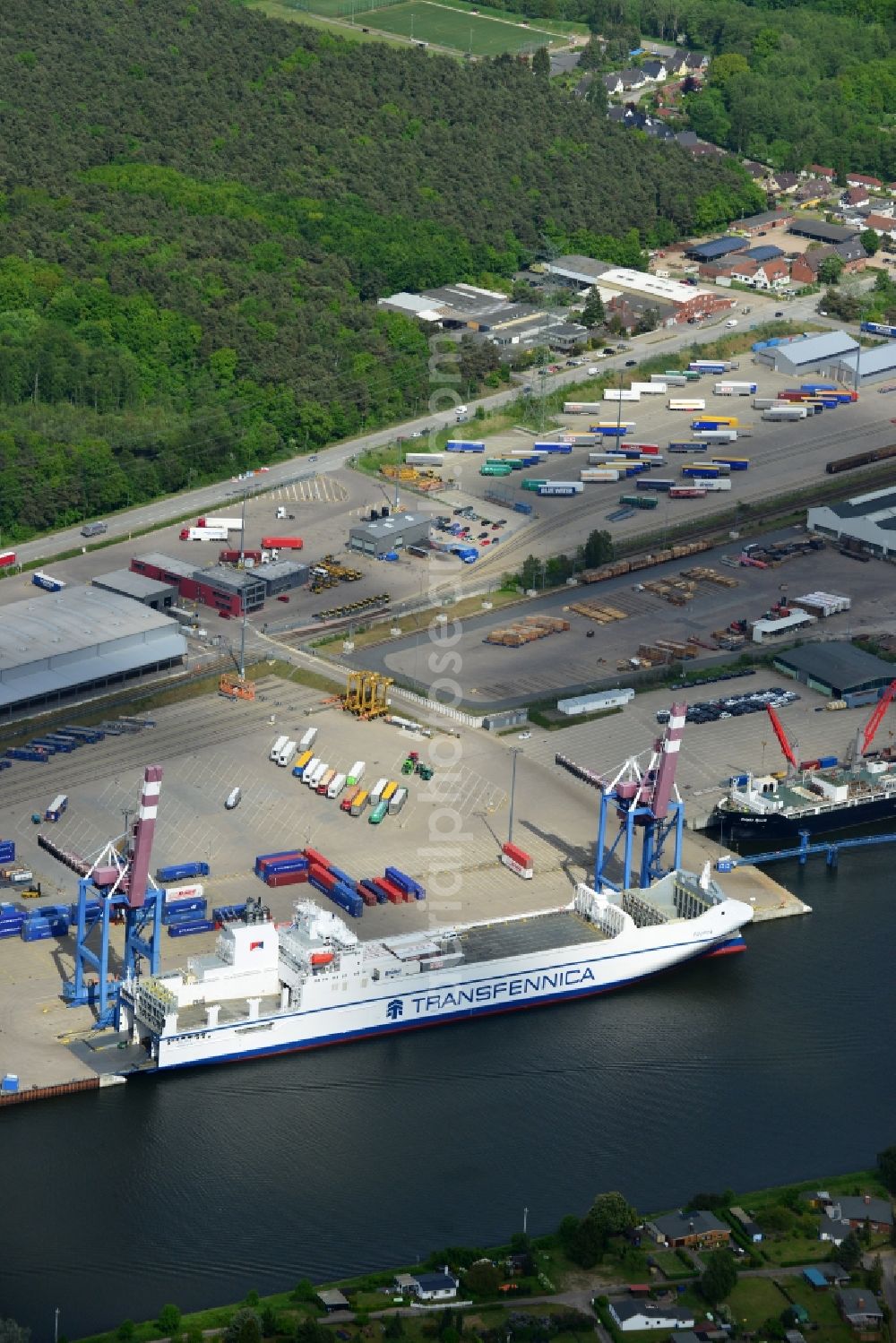 Lübeck from above - Container ship der Reederei Spliethoffs Bevrachtungskantoor BV in the port of Luebeck in the state Schleswig-Holstein