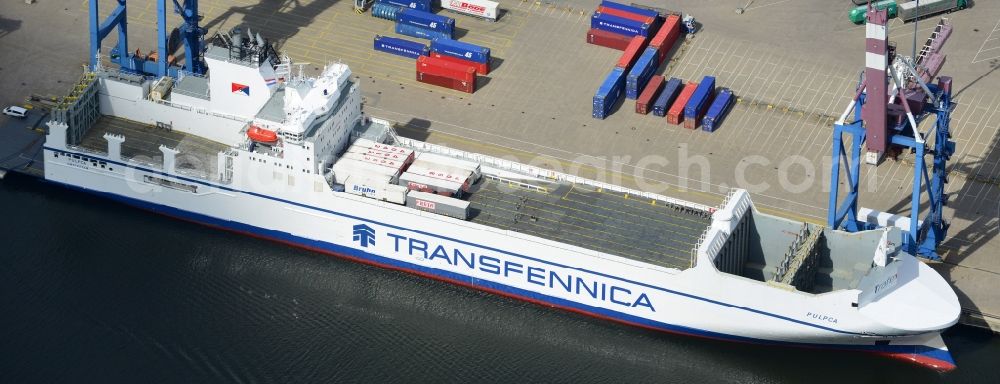 Lübeck from the bird's eye view: Container ship der Reederei Spliethoffs Bevrachtungskantoor BV in the port of Luebeck in the state Schleswig-Holstein