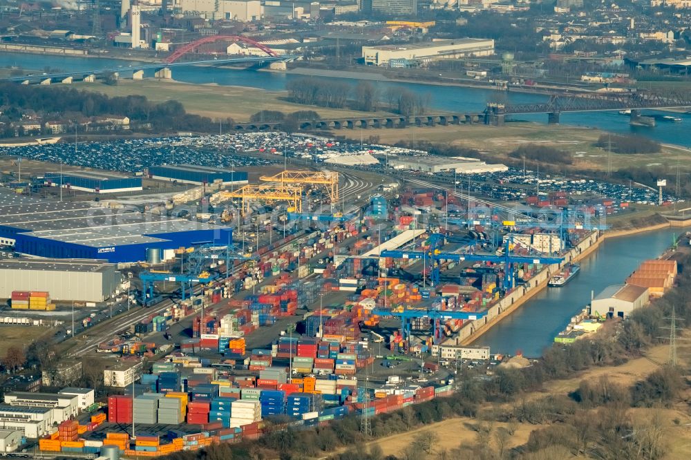 Duisburg from the bird's eye view: Of the container terminal in the container port of the inland port of the river Rhein during floods of DIT Duisburg Intermodal Terminal GmbH on Gaterweg in the district of Friemersheim in Duisburg in the state North Rhine-Westphalia, Germany