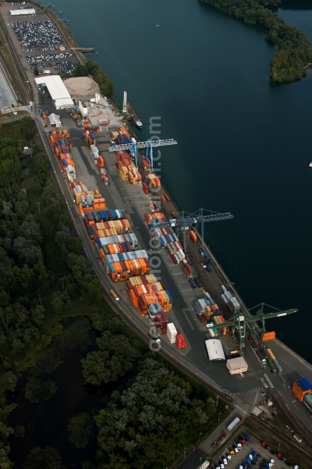 Aerial image Wörth am Rhein - Container terminal in the container port of Contargo Woerth-Karlsruhe GmbH on the lake of the Landeshafen in the district Industriegebiet Woerth-Oberwald in Woerth am Rhein in the state Rhineland-Palatinate, Germany