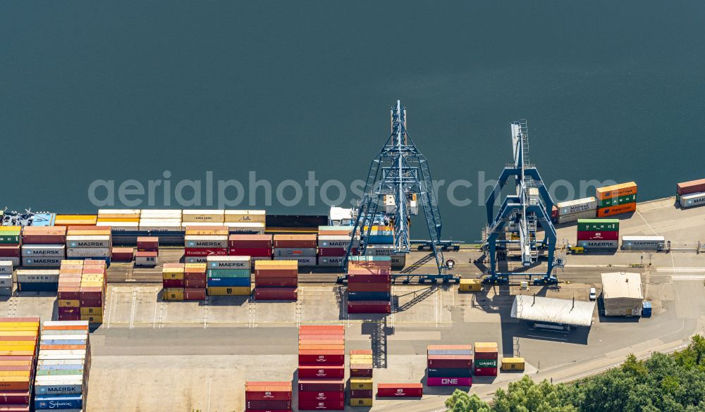 Aerial image Wörth am Rhein - Container terminal in the container port of Contargo Woerth-Karlsruhe GmbH on the lake of the Landeshafen in the district Industriegebiet Woerth-Oberwald in Woerth am Rhein in the state Rhineland-Palatinate, Germany