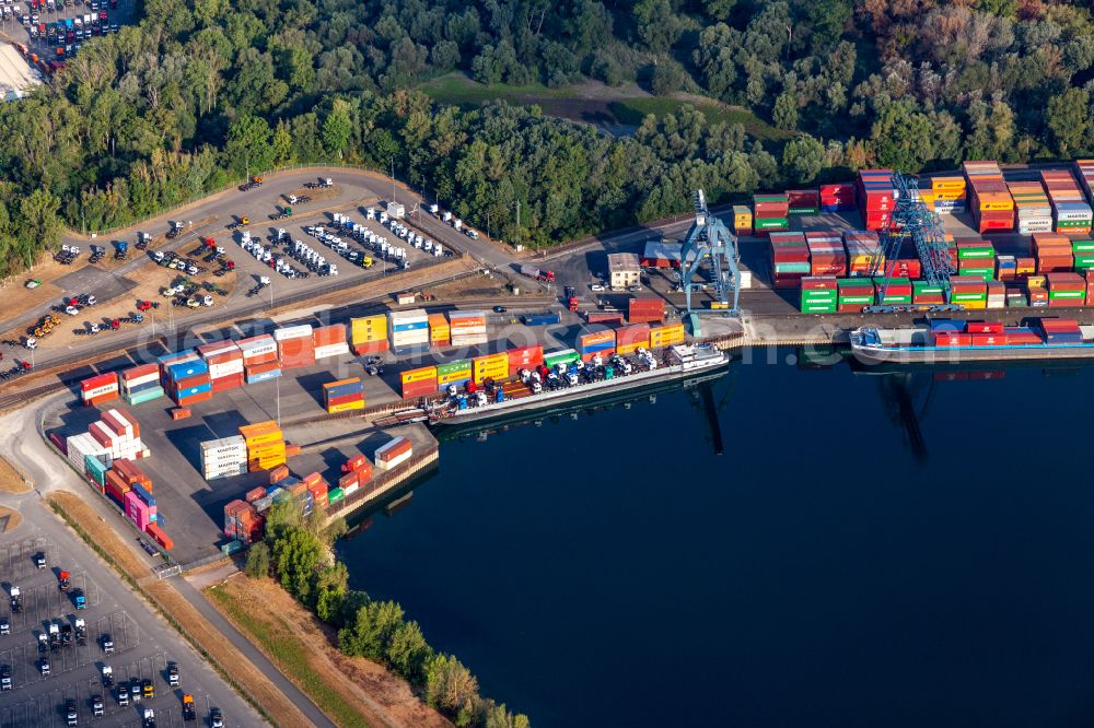 Aerial photograph Wörth am Rhein - Container terminal in the container port of Contargo Woerth-Karlsruhe GmbH on the lake of the Landeshafen in the district Industriegebiet Woerth-Oberwald in Woerth am Rhein in the state Rhineland-Palatinate, Germany