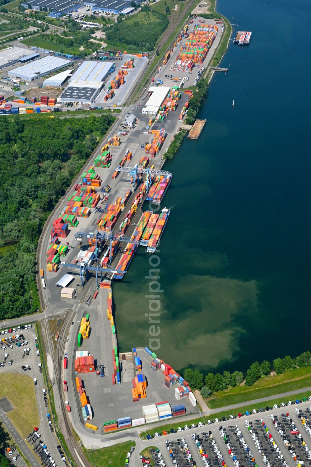 Aerial image Wörth am Rhein - Container terminal in the container port of Contargo Woerth-Karlsruhe GmbH on the lake of the Landeshafen in the district Industriegebiet Woerth-Oberwald in Woerth am Rhein in the state Rhineland-Palatinate, Germany