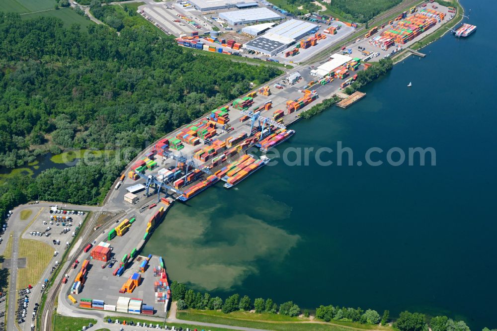 Aerial photograph Wörth am Rhein - Container terminal in the container port of Contargo Woerth-Karlsruhe GmbH on the lake of the Landeshafen in the district Industriegebiet Woerth-Oberwald in Woerth am Rhein in the state Rhineland-Palatinate, Germany