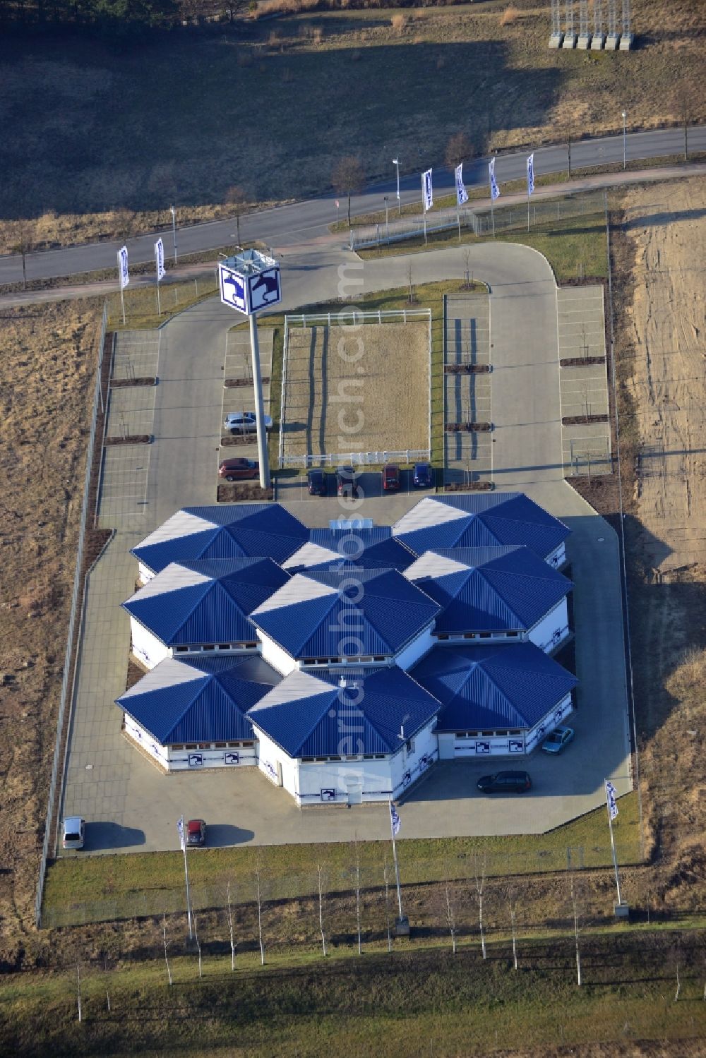 Kleinmachnow from the bird's eye view: Roof of the shopping center for equestrian sport in Kleinmachnow in Brandenburg