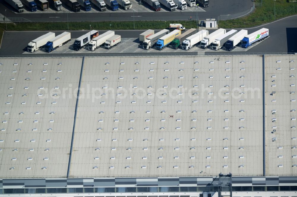 Bönen from above - Building complex and grounds of the logistics center and central storage of Kik Textilien GmbH in Boenen in the state of North Rhine-Westphalia. The centre is located in the industrial area in the East of Boenen. It consists of a series of loading docks for trucks