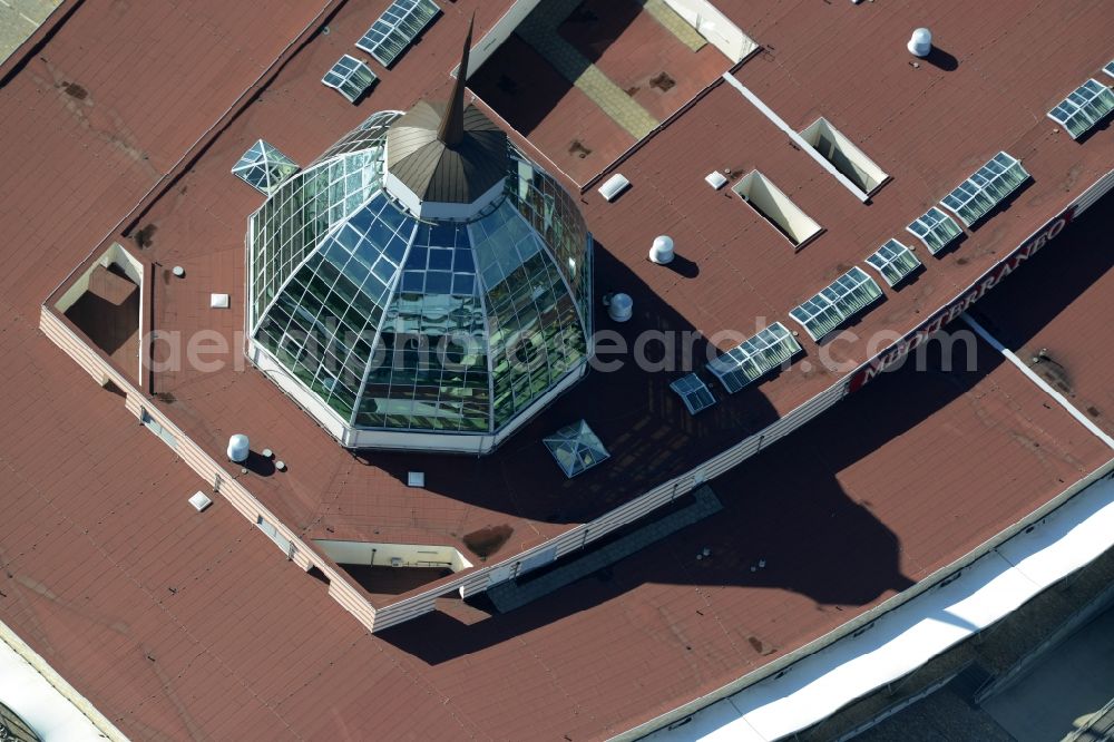 Aerial image Bremerhaven - Building of the shopping center Mediterraneo in Bremerhaven in the state of Bremen. The mall is part of a building complex on the old harbour on the riverbank of the river Weser