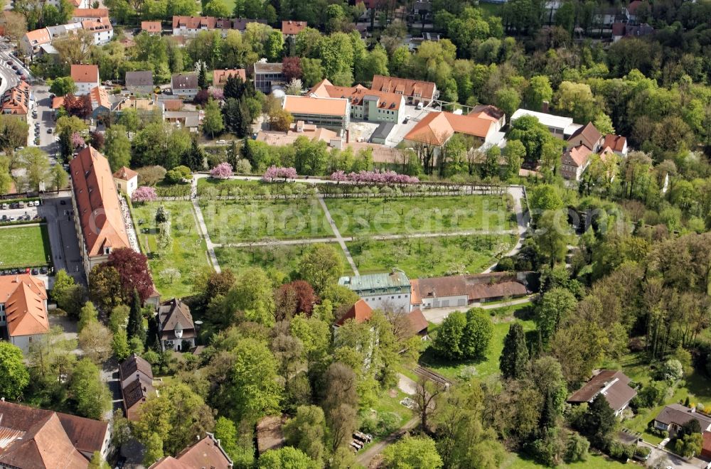 Aerial image Dachau - The Dachau Palace on the Schlossberg of Dachau in the state Bavaria goes back to an early medieval Castle of the Counts of Dachau and was the summer residence of the Wittelsbach family. In the castle garden / courtyard is a portico of linden trees, on the terrace, the Schloss Cafe