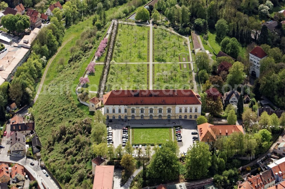 Dachau from the bird's eye view: The Dachau Palace on the Schlossberg of Dachau in the state Bavaria goes back to an early medieval Castle of the Counts of Dachau and was the summer residence of the Wittelsbach family. In the castle garden / courtyard is a portico of linden trees, on the terrace, the Schloss Cafe