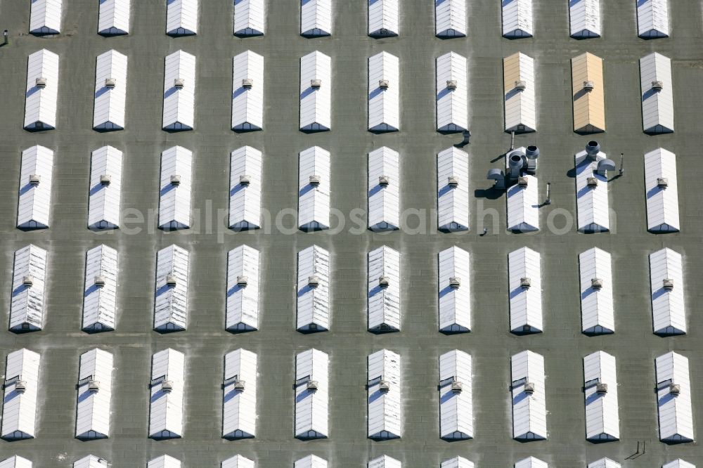 Aerial image München - Roof structures on a factory building Krauss-Maffei Wegmann GmbH & Co. KG in Munich in Bavaria. kmweg.de