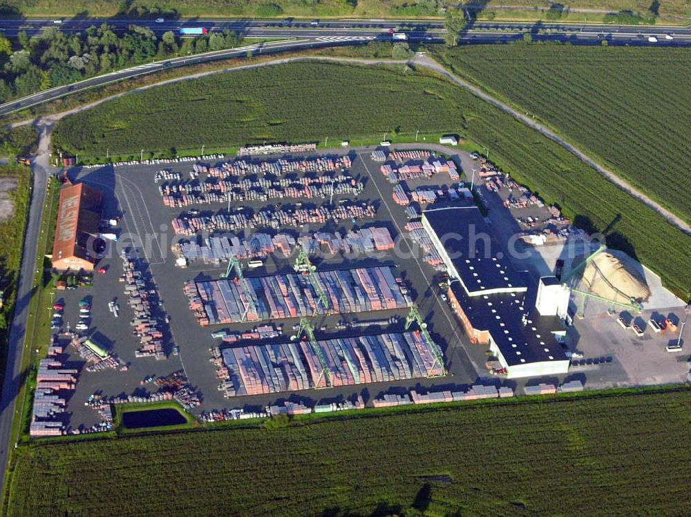 Schönerlinde ((Barnim/ Brandenburg) from the bird's eye view: Blick auf das Baustoff-/ und Dachziegelwerk Nelskamp bei Schönerlinde an der A10 nördlich von Berlin. - Dachziegelwerke Nelskamp GmbH Werk Schönerlinde Bahnhofstraße 6 16352 Schönerlinde/ Barnim Telefon: 0 30/94 03 91 0 Telefax: 0 30/9 41 22 04