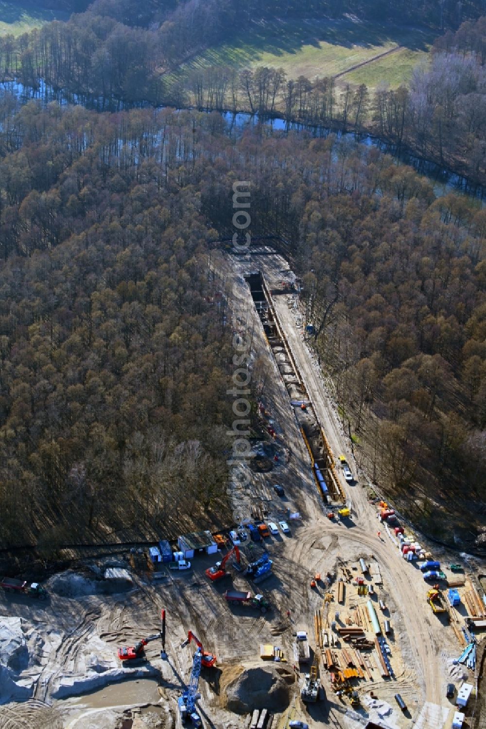 Aerial image Bindow - Construction site with earthworks and landfills on river Dahme crossing for the laying of pipelines of the new Europaeischen Gas-Anbindungsleitung ( Eugal ) in Bindow in the state Brandenburg, Germany