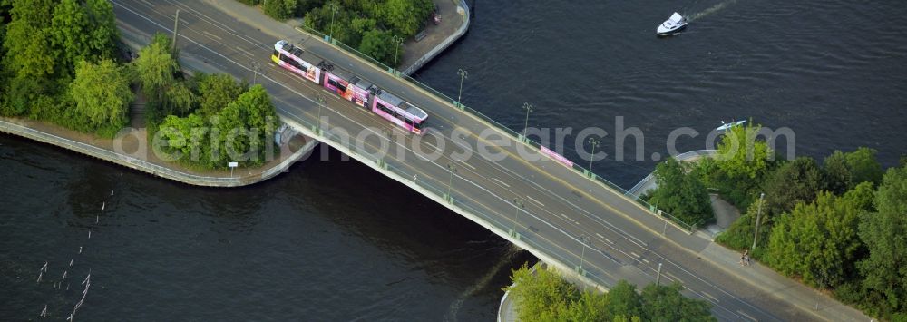 Berlin from above - Damm Bridge over the river Spree in the Koepenick part of the district of Treptow-Koepenic in Berlin in Germany. Lindenstrasse street and tram tracks are taking their course over the bridge from the 1980s