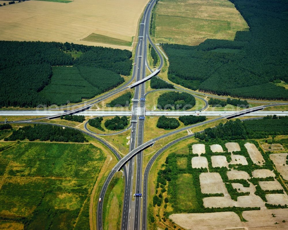 Schönefeld from the bird's eye view: The motorway junction in Schönefeld in the state of Brandenburg. The junction connects the three highways A113, A13 and A10. It was designed in a clover leaf style and was completely refurbished in the 1990s