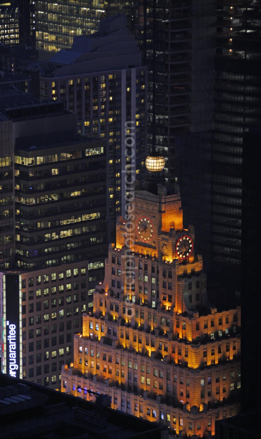 Aerial photograph New York - The Paramount Building is a skyscraper in Manhattan at the Broadway in the style of Art Deco It was built from 1926 until 1927 for Paramount Pictures. In addition to the offices of the film company, the building also had a large movie theater. The glass ball and the clock is illuminated at night