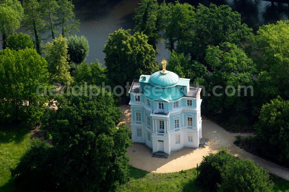 Berlin from above - Belvedere on the river Spree in the district of Charlottenburg in Berlin. The baroque-classicist building was built as a tea house and lookout in the park of Charlottenburg Palace in 1788/89. The oval building with turquoise roof - with its golden figurines on top - is listed as a protected building
