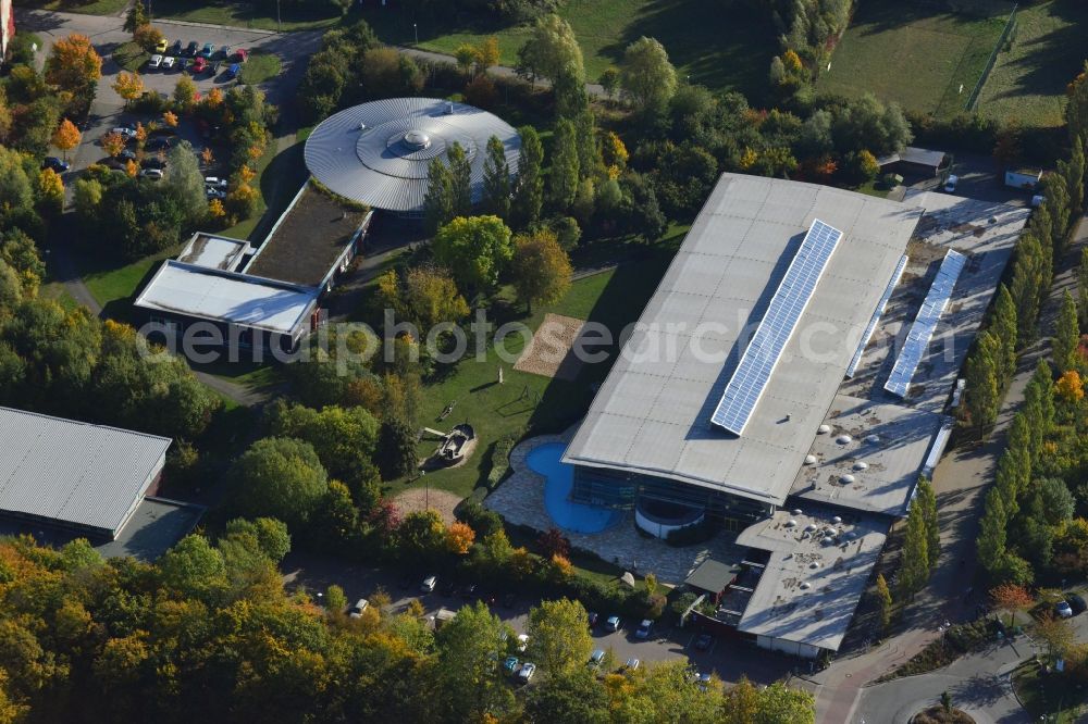 Greifswald from above - View at the BBW Berufsbildungswerk and the leisure bath in Greifswald in the federal state Mecklenburg-Vorpommern. The BBW Greifswald is a specialized facility for vocational preparation and training of young people with disabilities. It is operated by the BerufsBildungsWerk Greifswald gGmbH. Operator of the bath is the Stadtwerke Greifswald GmbH