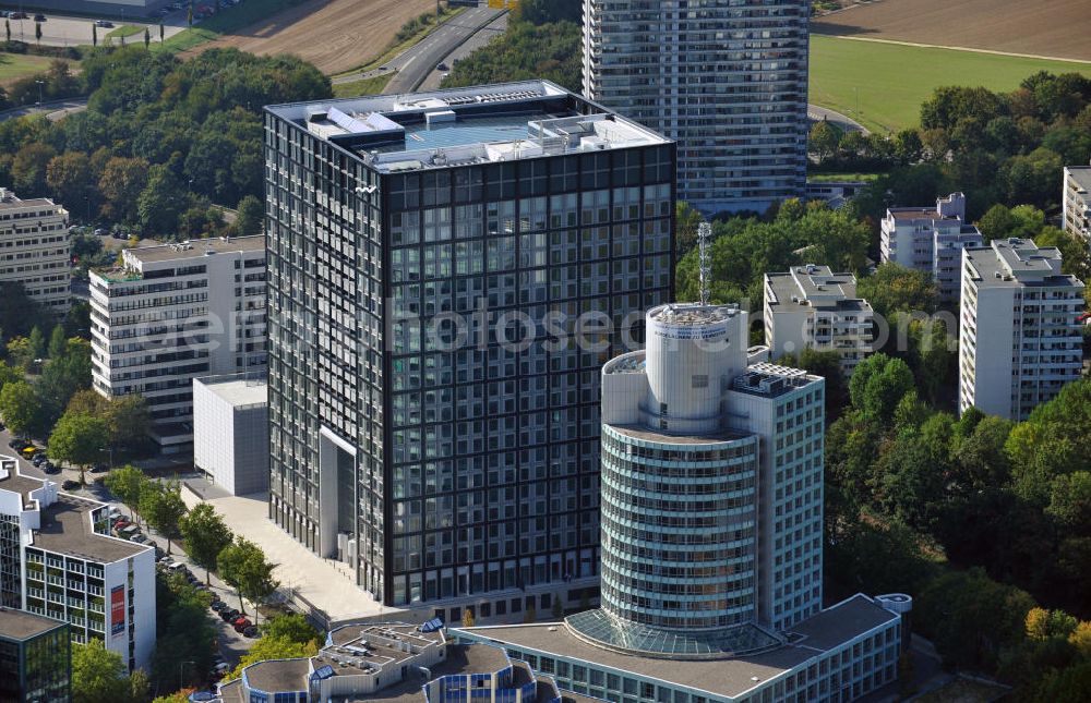 Eschborn from the bird's eye view: View at the commercial area Süd inEschborn with the office building Taunus Tower and the branch of the German stocks exchange, which was opened in 2010