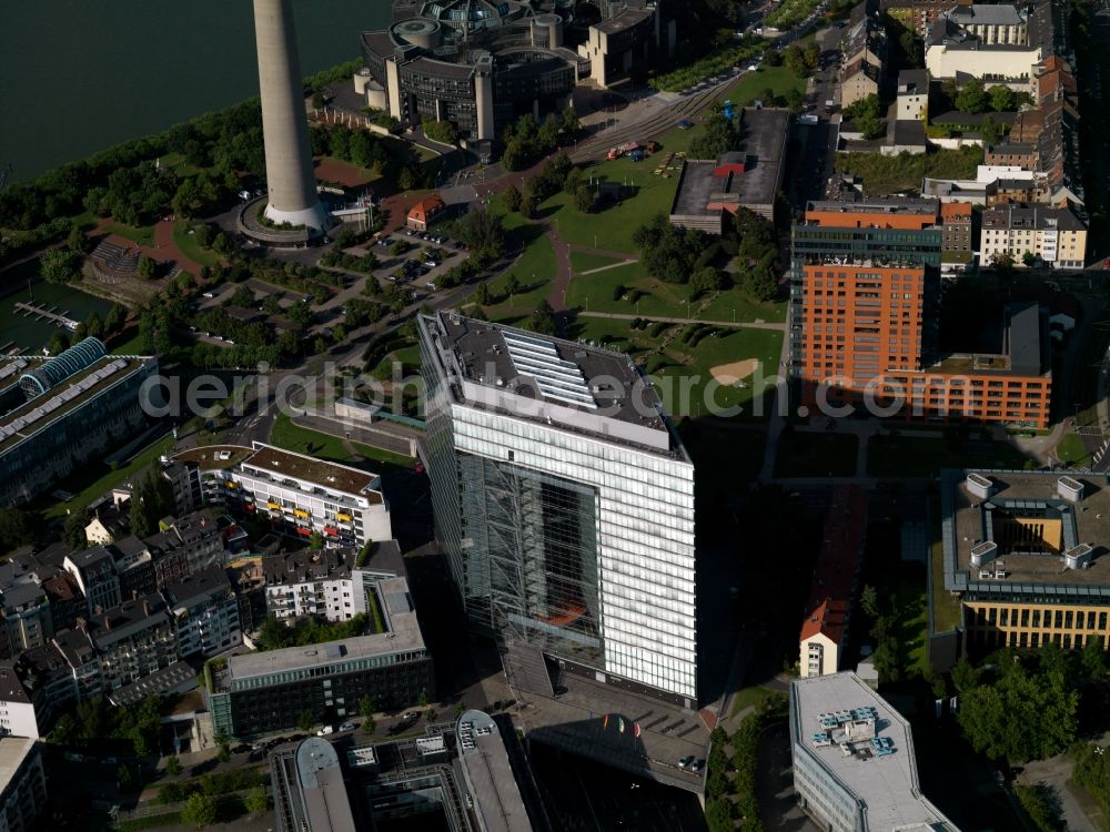 Düsseldorf from the bird's eye view: The office tower Stadttor in the Unterbilk part of Düsseldorf in the state of North Rhine-Westphalia. It was designed by the architects Petzinka, Overdiek and Partner and is home and seat of the prime minister of North Rhine-Westphalia. It is located in the government district of the city and was opened in 1998. The distinct red building next to it is the Portobello tower, another office building built by the architects Döring, Dahmen, Joeressen