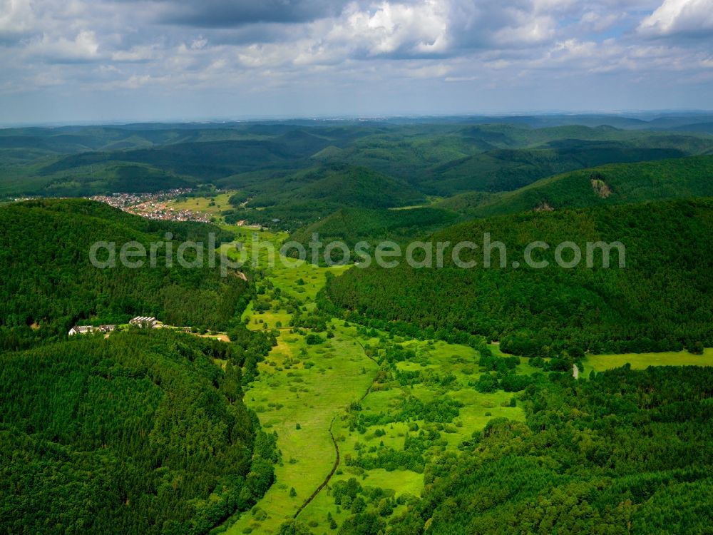 Dahn from above - The Dahn Rockland in the county of Südwestpfalz in the state of Rhineland-Palatinate. County capital is the city of Dahn. The region belongs to the Southern Palatinate Forest, characterised by hills, woods and the name-giving rocks. It is a favoured tourist site because of its various ruins, castles and rock climbing facilities