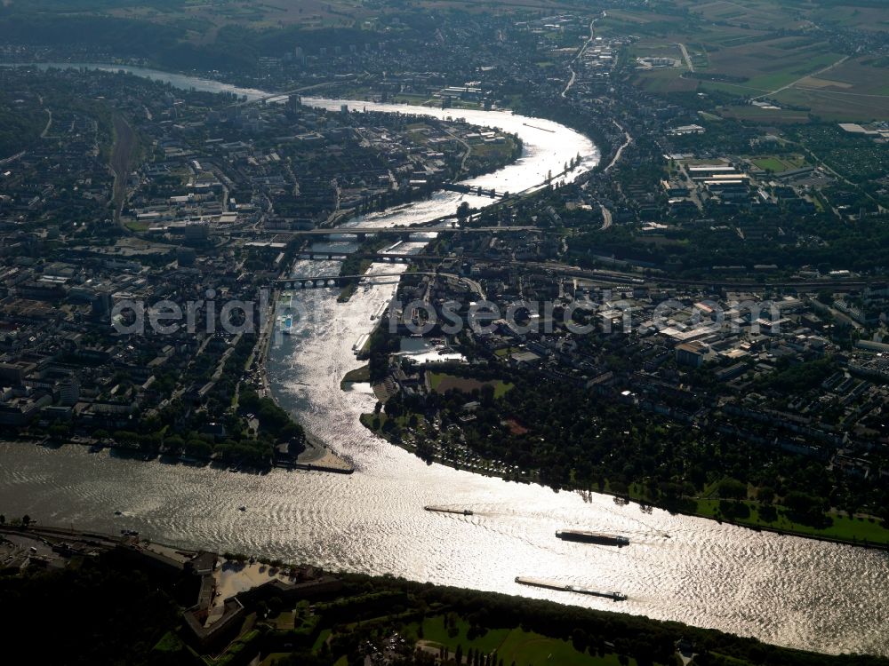 Aerial image Koblenz - Deutsches Eck (German Corner) in Koblenz in the state of Rhineland-Palatinate. The corner is an artificial headland where the Moselle joins the Rhine. It is the city's landmark and important tourist site. Located on the western riverbank are the Rhine shores and on the right Moselle riverbank is the Peter-Altmeier-Embankment