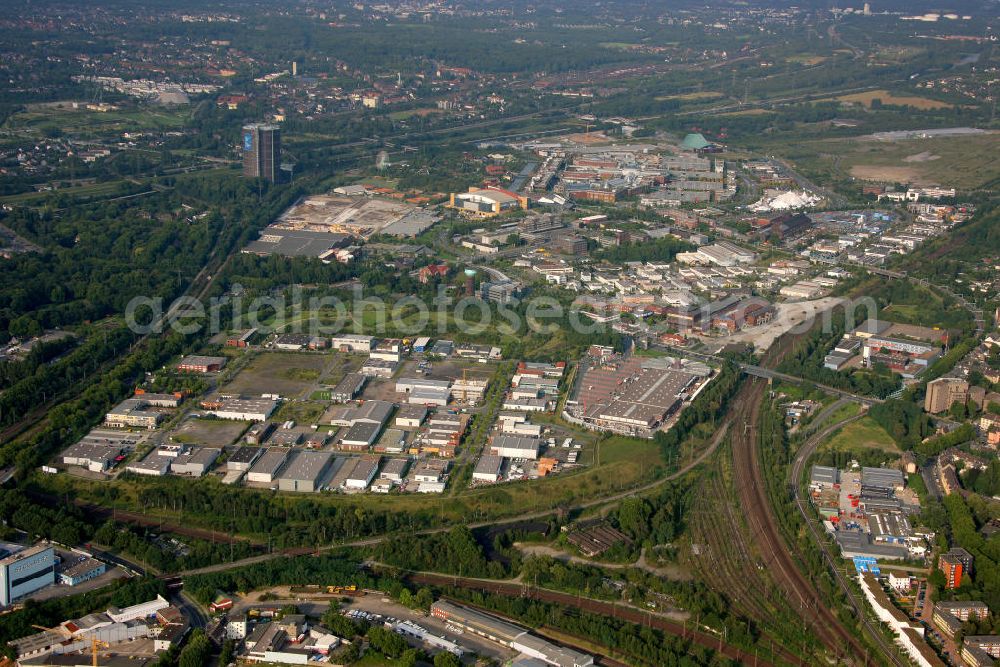 Aerial photograph Oberhausen - The CentrO is one of the largest shopping centers and urban entertainment center in Germany. It forms the core of the new center of Oberhausen. Over 250 retail shops spread out geographically in different areas, arranged on two floors of the mall. On the outside is a promenade, a multiplex cinema and the König Pilsener Arena. In the background is the industrial memorial Gasometer