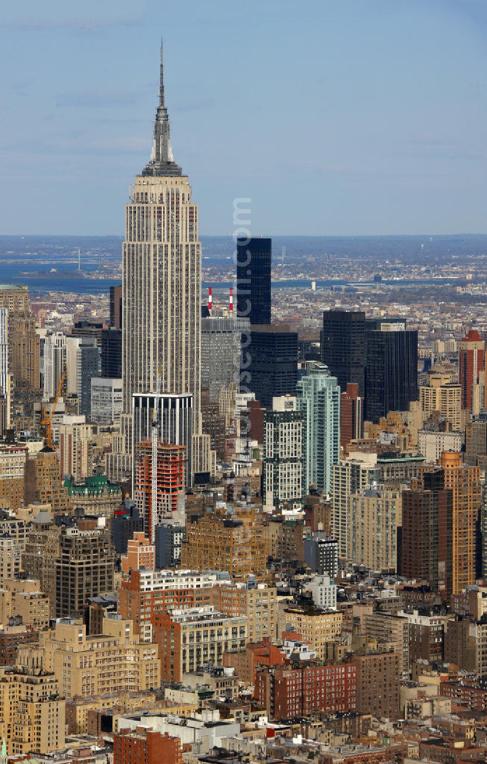 Aerial image New York - View of the Empire State Building, a skyscraper in Manhattan in New York City. The rooms of the 102 floors of the Empire State Building will be used primarily for commercial purposes. In the open area in the 86th Floor and in the 102nd Floor are publicly accessible viewing platforms, which are among others the most visited tourist attractions. The building was designed by the New York architectural company of Shreve, Lamb and Harmon