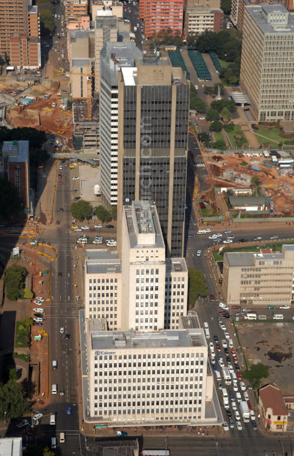 Aerial image JOHANNESBURG - The Eskom Center in Johannesburg, South Africa. The skyscraper is located in the central business district of the city and it was the former headquarter of the electricity producer Eskom until 1980. Behind the Eskom Center lies the Logistics House, the former headquarter of the airline company South African Airways