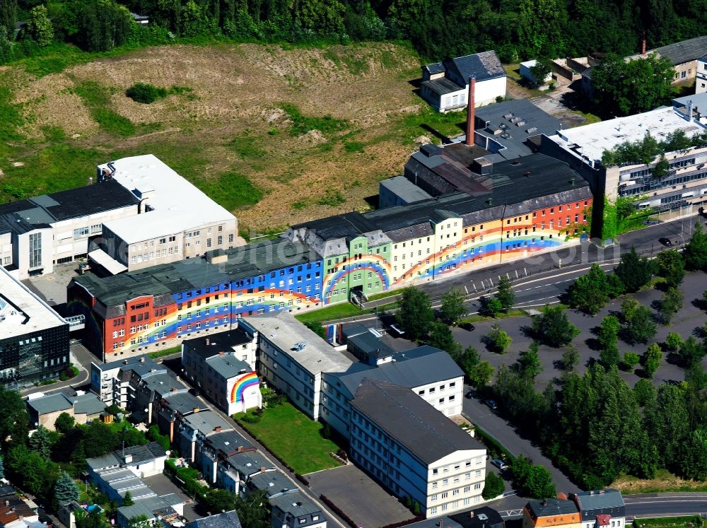 Aerial image Selb - The building of the Rosenthal AG company in the town of Selb in the state of Bavaria. The facade was designed and painted in 1973 by the artist Otto Piene. The wall painting is 195 metres long and 18 metres high. The building is also called the Rainbow House and is a landmark of the porcellain producer and the town