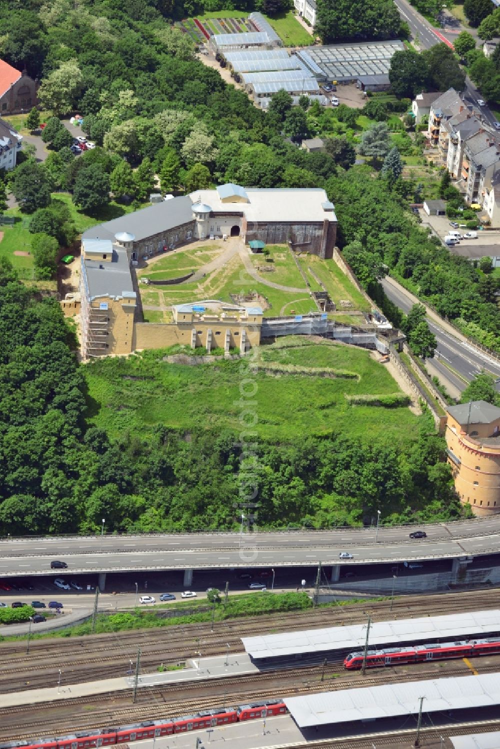 Aerial photograph Koblenz - The fort Großfürst Konstantin in the Karthause district of the city of Koblenz in the state of Rhineland - Palatinate. The fort is located on the Hunsrück mountain in the West of Koblenz main train station. The fort is part of the former stronghold and fortress of the city, overlooking the Rhine river. During the second World War, it was used for air raid protection and as a bunker