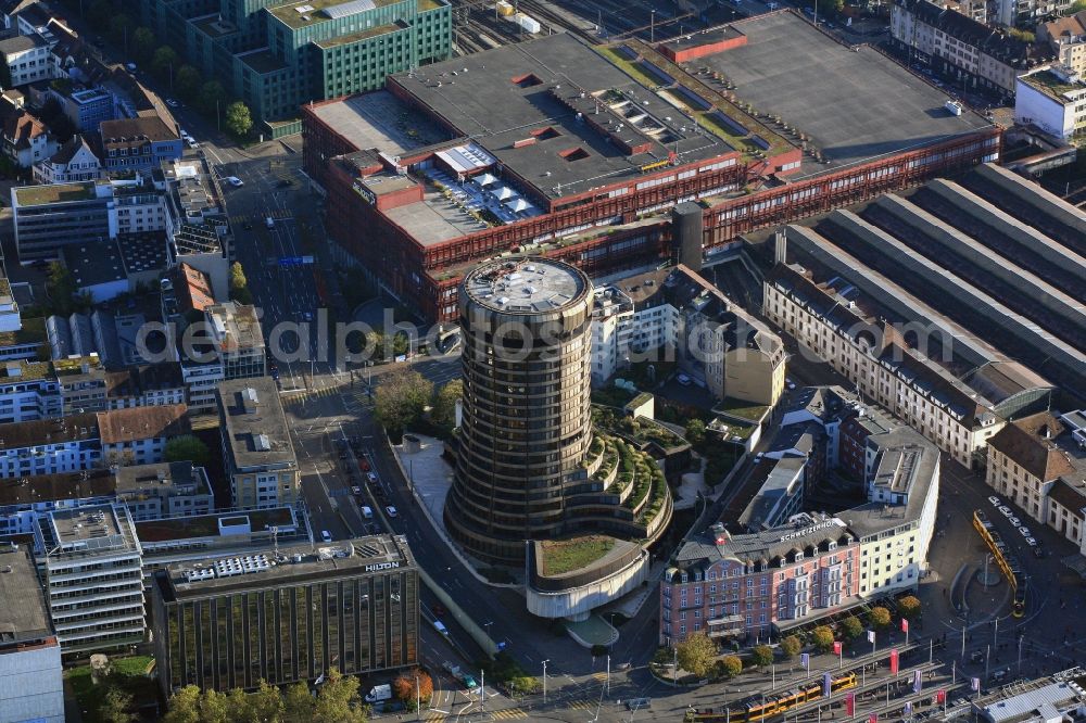 Aerial image Basel - The round tower of the Bank for International Settlements BIS in Basel, Switzerland is an impressive skyscraper and dominates the cityscape at Basel SBB train station