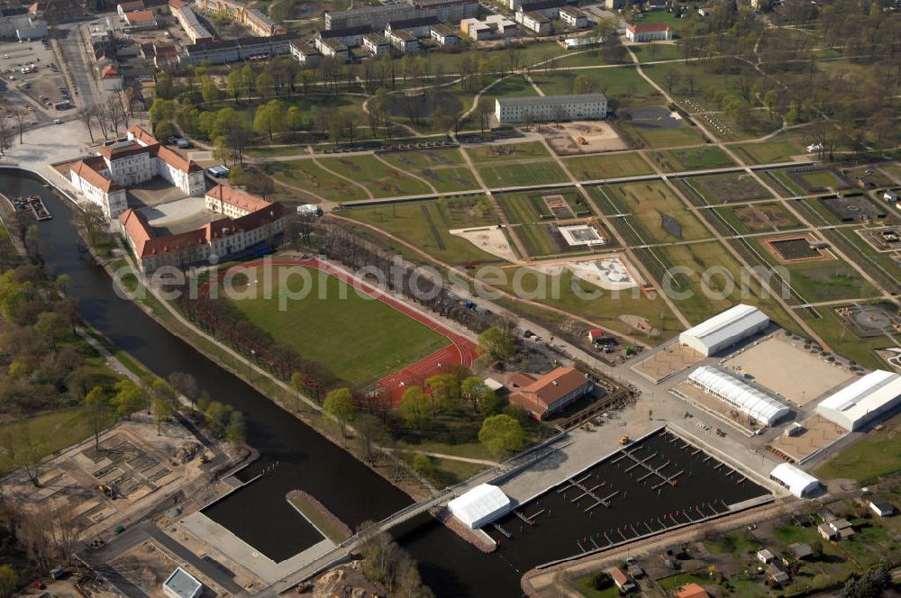 Aerial image ORANIENBURG - Blick auf das Schloss Oranienburg mit dem Gelände der Landesgartenschau. Das Schloss Oranienburg ist das älteste Barockschloss in der Mark Brandenburg. Bis 1999 wurde das Gebäude umfassend saniert und restauriert. Als bedeutsam erachtete historische Räume konnten wiederhergestellt werden, u.a. der Orange Saal. Das Schloss wird seitdem von der Stadtverwaltung genutzt und beherbergt das Schlossmuseum, getragen von der Stiftung preußischer Schlösser und Gärten und dem Kreismuseum Oranienburg. Oranienburg richtet unter dem Motto „Traumlandschaften einer Kurfürstin“ die brandenburgische Landesgartenschau 2009 aus. Geöffnet ist die Landesgartenschau vom 25. April bis zum 18. Oktober 2009. Kontakt: Schlossmuseum Oranienburg: Jörg Kirschstein, Abteilung Schlossmanagement, Schlossbereichsleiter, Schlossplatz 1, 16515 Oranienburg, Tel. +49 (0)3301 53 74 37/ -38, Fax +49 (0)3301 53 74 39,