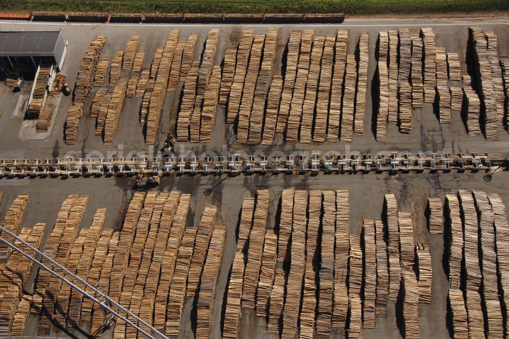 BRILON from above - The lumberyard of the externally delivered wood for the chipboard, laminate plant and sawmill Egger GmbH & Co. KG in Brilon in North Rhine-Westphalia